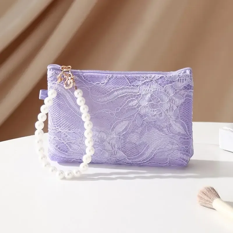 pochette de maquillage en dentelle avec bracelet de poignet en perles, design semi-transparent, pochette cosmétique pour le rangement quotidien et les voyages.