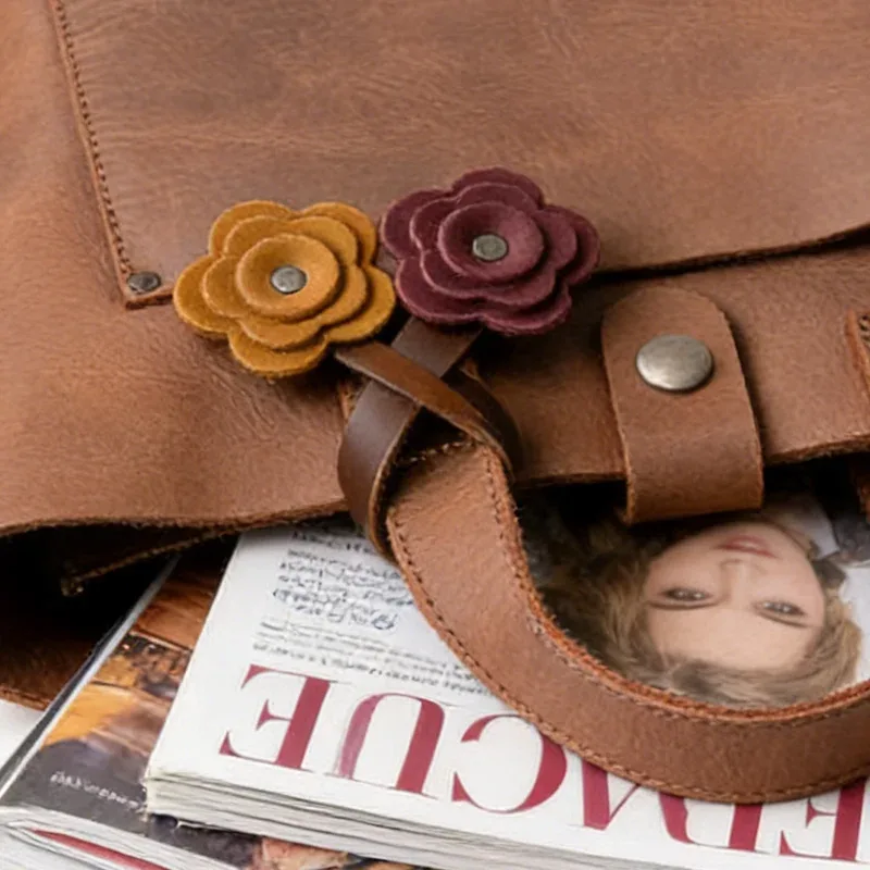 pochette sac rond cuir marron anses cuir fleurs décoratives orange rose accessoire voyage organisateurs légers travail loisirs