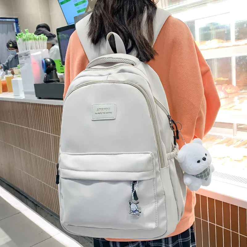 sac à dos d'étudiant rose imperméable à la mode pour femmes, nouveau sac d'école de loisirs de voyage pour filles, sac d'université de livre mignon en nylon pour ordinateur portable
