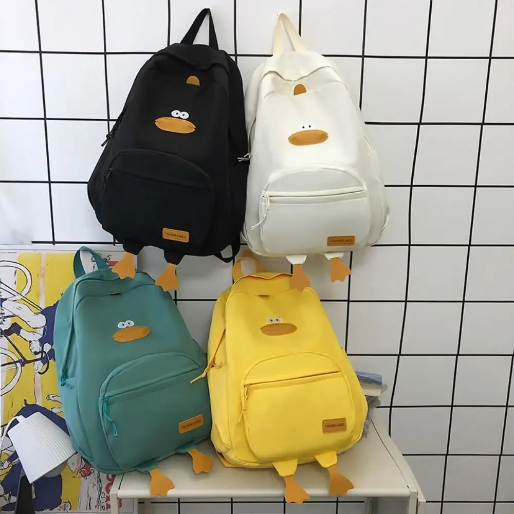 sac de voyage en nylon avec motif de canard de dessin animé, sac à dos à 3 couches avec poches zippées pour tout-petits, sac d'école de grande capacité pour étudiants et filles