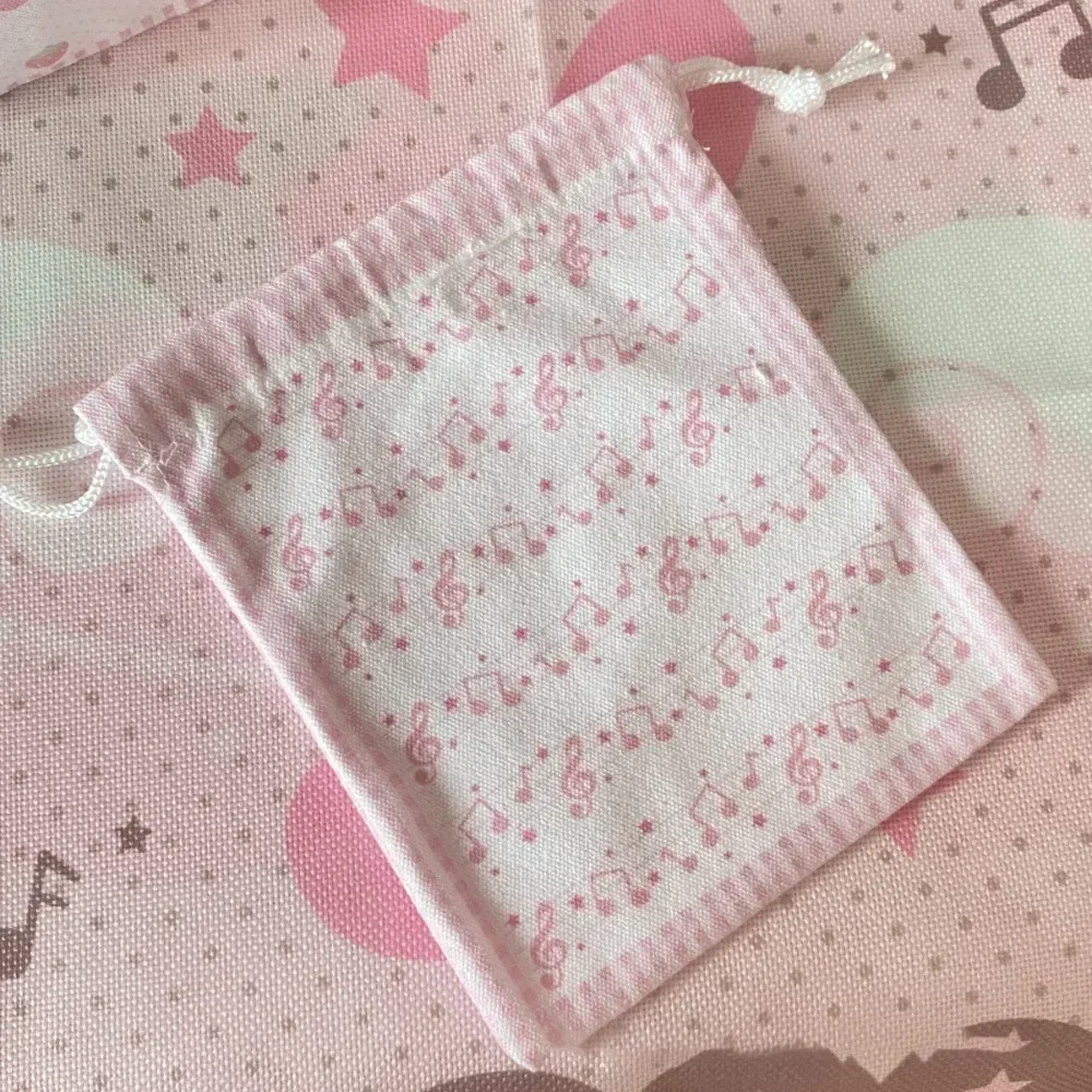 nouvelle pochette à cordon grande capacité motif fraise et note de musique, sac à monnaie portable, pochette de rangement pour maquillage, cadeau, motif dessin animé