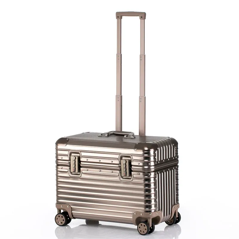 valise aluminium argent doré beige toupie roulettes poignée plaque centrale gris voyage business week-end