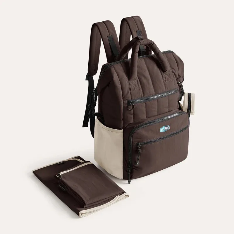sac dos polyester beige accents verts poches multiples grande capacité maternité sorties mains libres bébé ordinateur portable