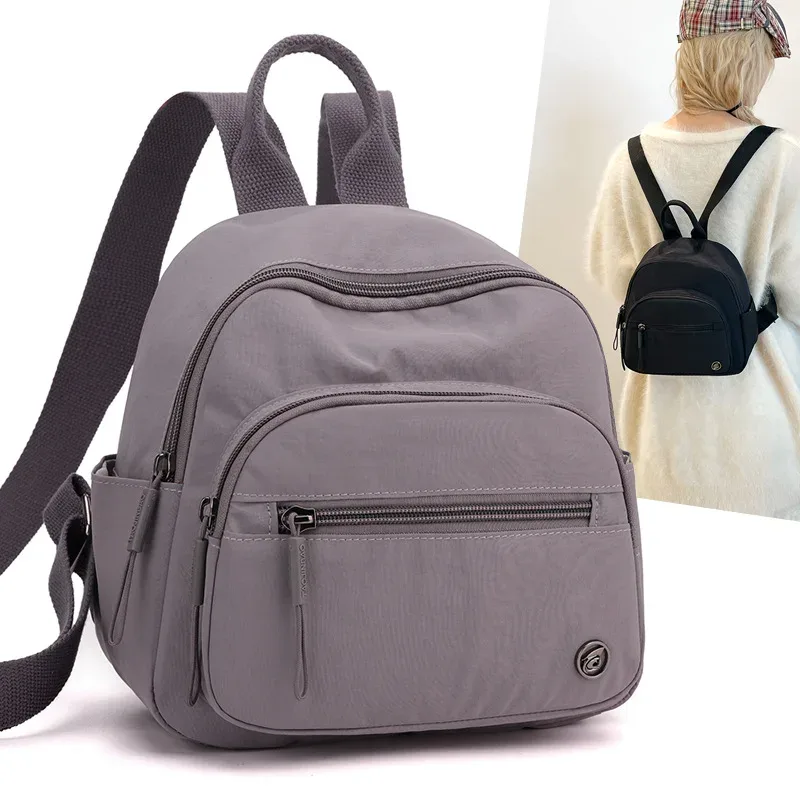 sac à dos portable en nylon pour femme, couleur unie, léger, multi-poches, décontracté, tendance, imperméable, nouveau cadeau 2026