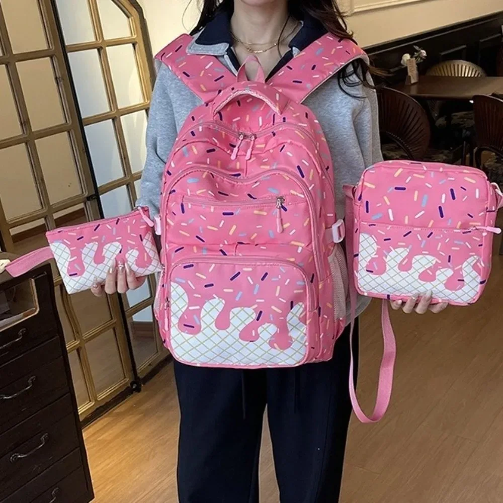 sac dos toile oxford motifs crème glace couleurs roses blanches format petit taille grande capacité bandoulière trousse crayons usage étudiant sortie