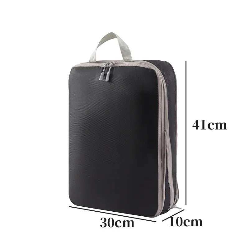 organisateur voyage polyester blanc bandes grises format rectangulaire poignées grises compression vêtements articles toilette rangement valise