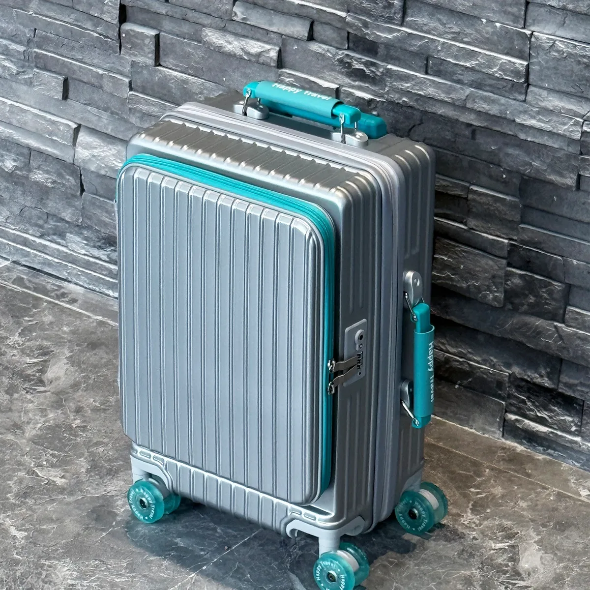 valise bagage rigide abs blanc vert roulettes toupie poignée télescopique couche extensible serrure douanière usage voyage longue distance vacances mer
