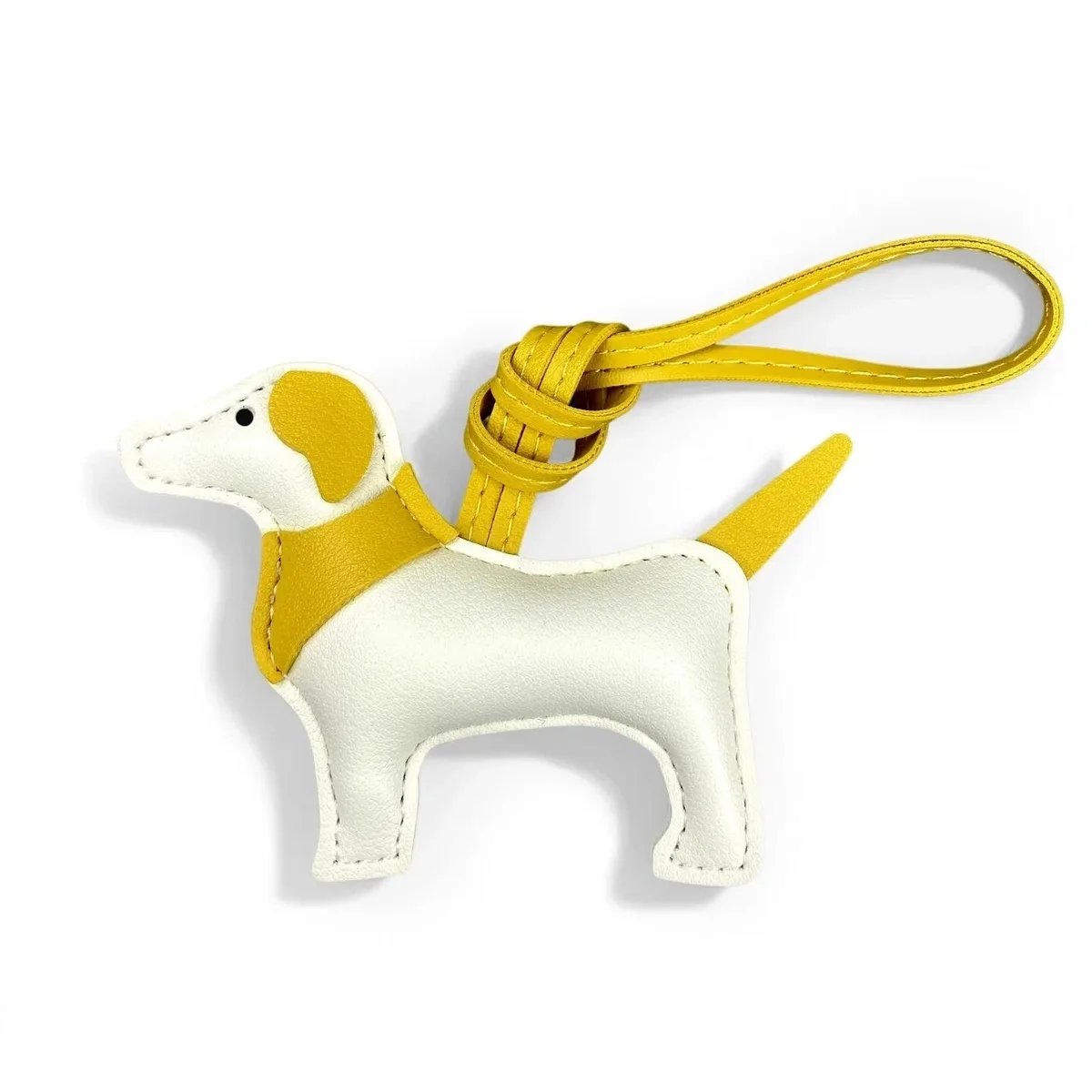 sac dos cuir motif chien silhouette orelles criniere couleurs contrastantes ornements voyage usage journee accessoires sac main porte clefs