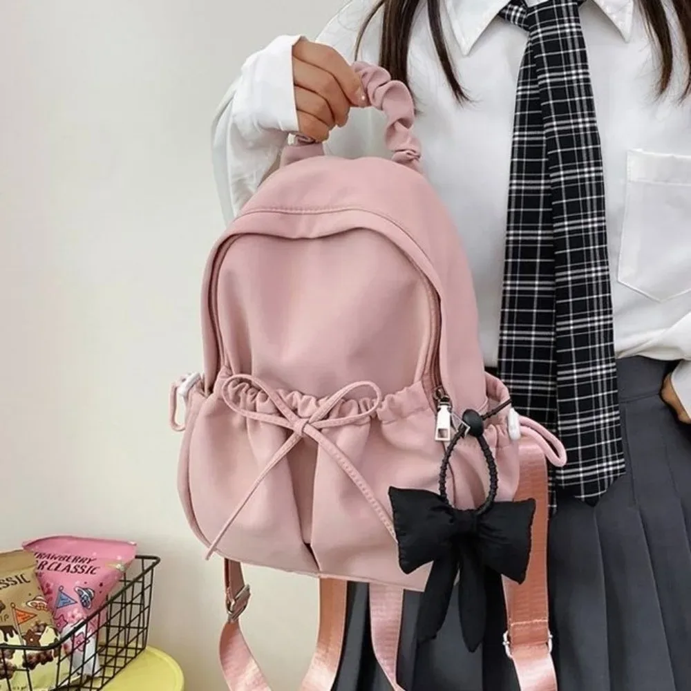 sac à dos en nylon pour étudiants avec cordon de serrage, bretelles réglables, design plissé, sac de voyage souple de grande capacité, sac à dos avec nœud.