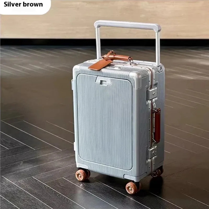 valise roulettes toupie poignée supérieure texture rugueuse couleur blanche accents violet doré usage voyage