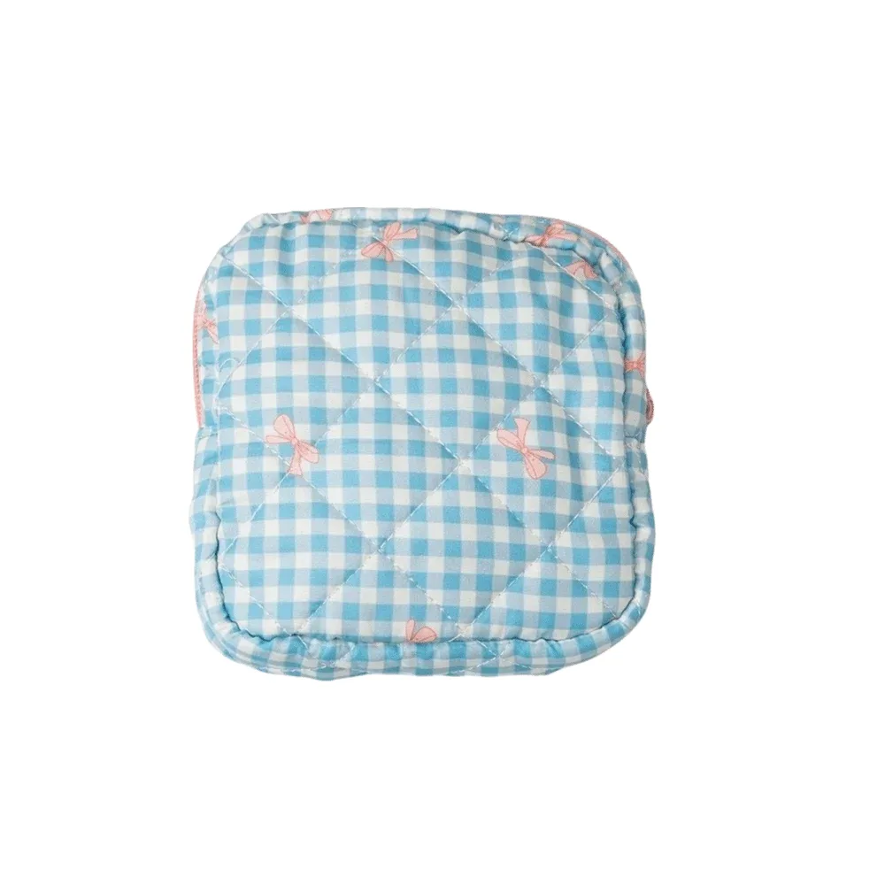sac de rangement pour serviettes hygiéniques à motif à carreaux, sac cosmétique multifonctionnel, mini sac de voyage matelassé portable pour maquillage.