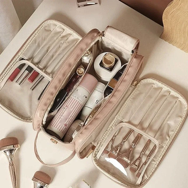 sac de maquillage multifonctionnel pour femmes, grande capacité, portable, haut de gamme pour les voyages, sac de rangement pour pinceaux de maquillage et articles de toilette.