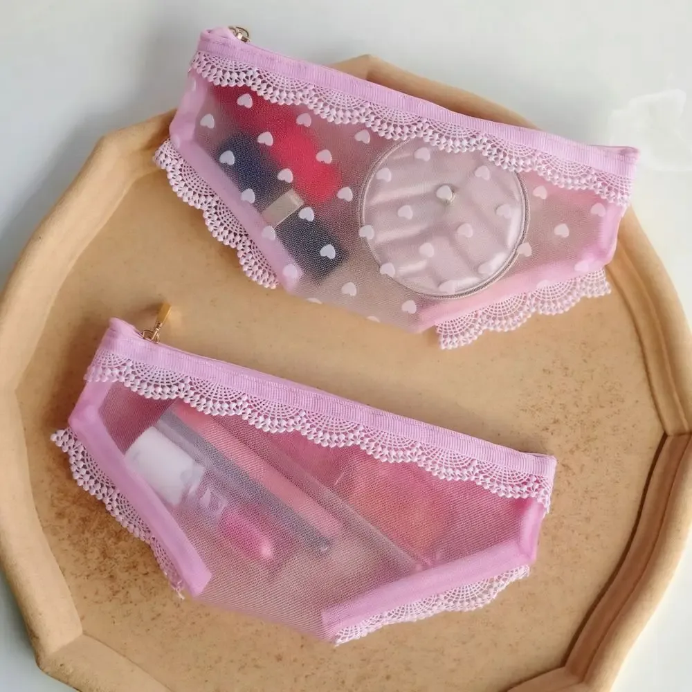 pochette de rangement cosmétique unique en forme de slip, en maille dentelle cœur, transparente, style y2k, pour maquillage et articles de toilette de voyage