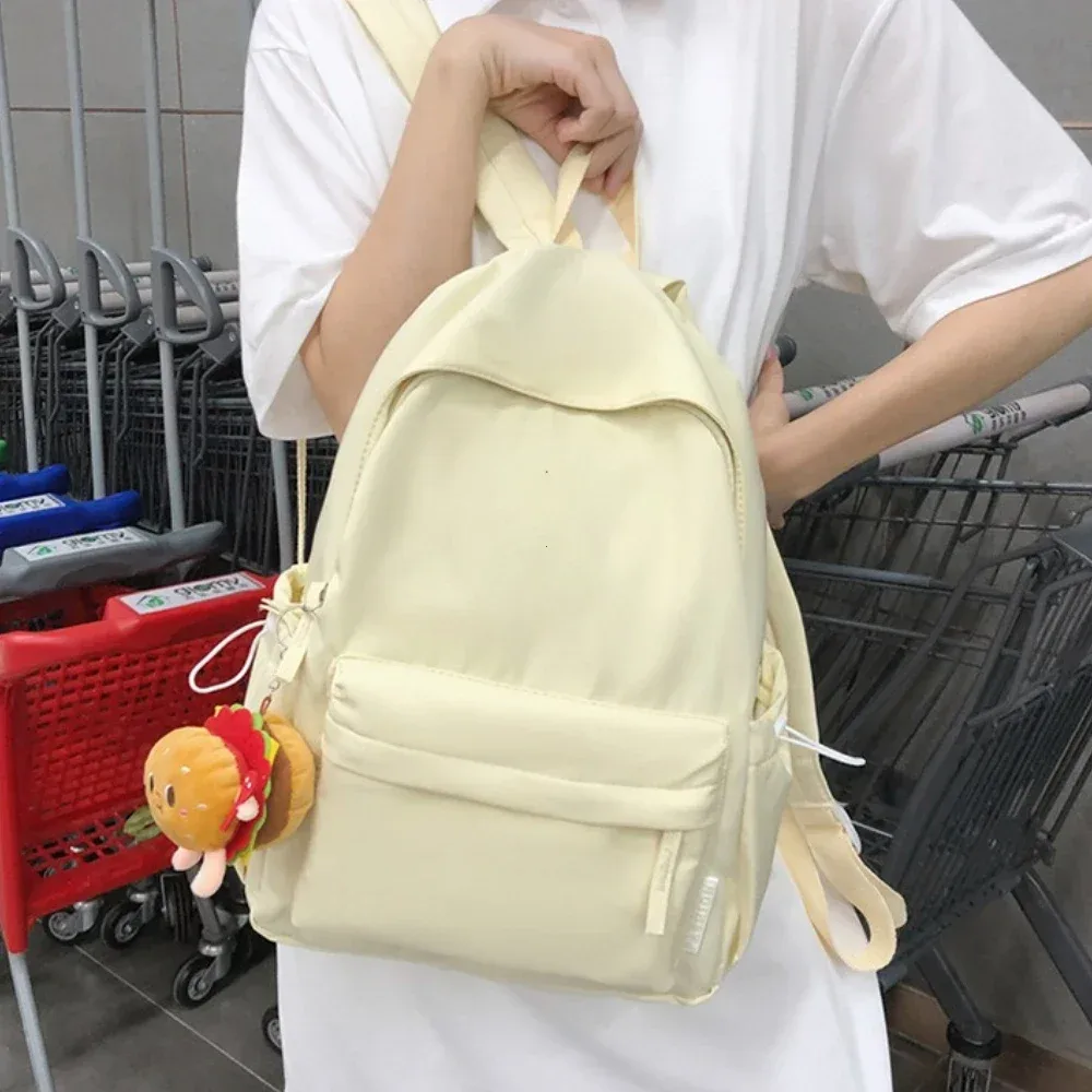 sac dos nylon polyester unisexe poche latérale zippée porte clés hamburger couleur solide voyage loisirs