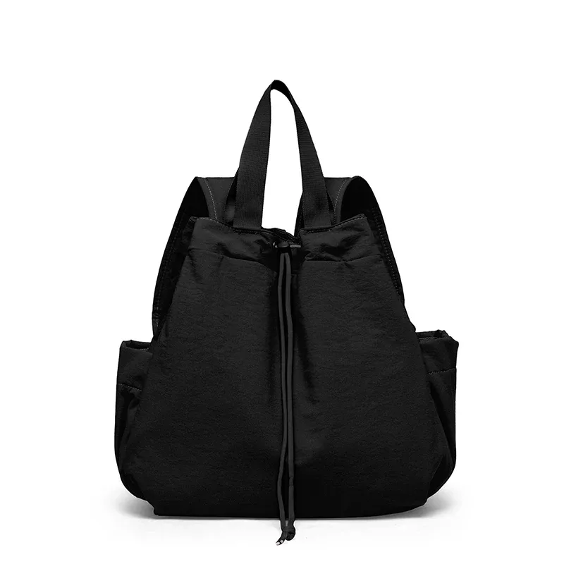 sac dos nylon beige orange jaune femelle trapézoïdale poignée amovible poches boutons glissière latérale voyage
