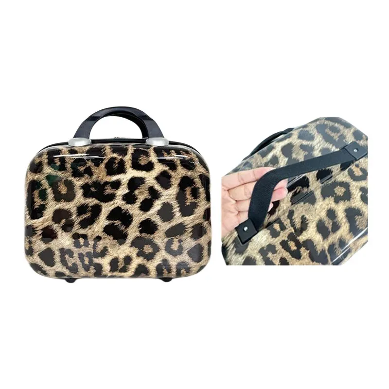 valise motif léopard beige roulettes noires poignée supérieure compartiments intérieur gris clair voyage femme