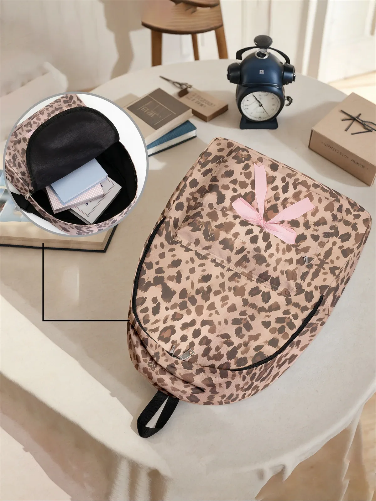 sac à dos à motif léopard et nœud, nouveau modèle 2025, sac à dos de voyage décontracté, léger et simple.