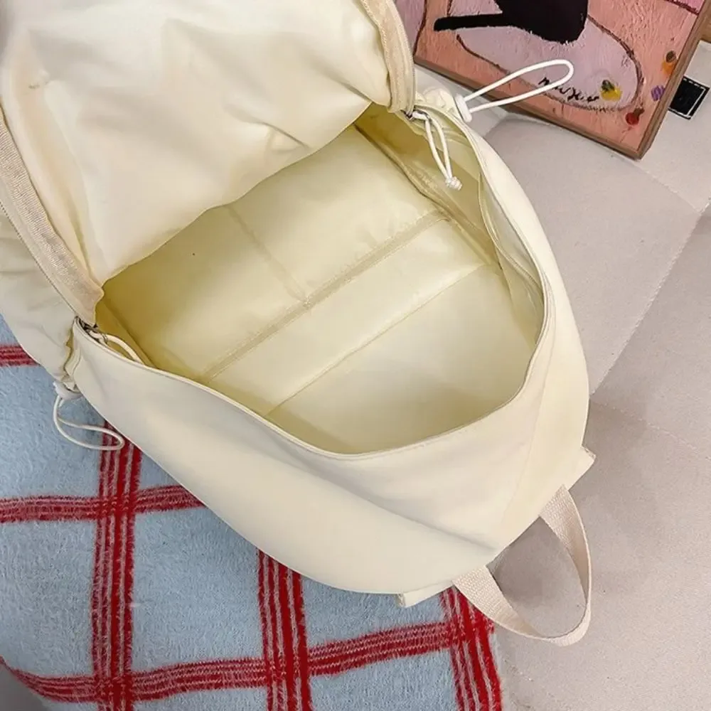 sac à dos polyvalent à ailes d'ange, couleur unie, grande capacité, sac à dos en toile, style y2k, motif brodé, sac à dos en nylon