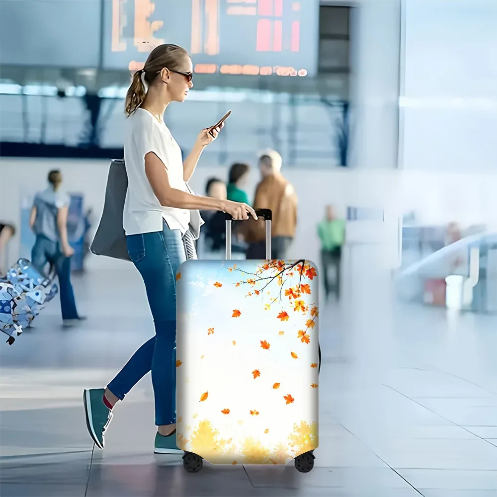 housse valise polyester motif feuilles automnales orange jaune fonds bleu ciels format moyen protection voyage