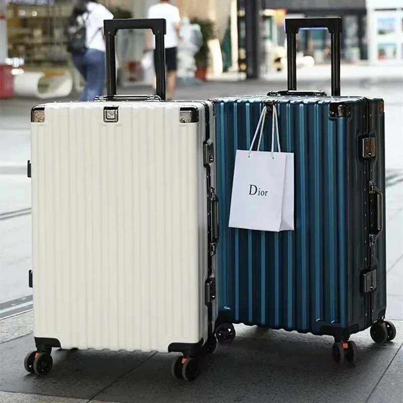 valise bagage roulettes abs blanc noir vert pastel lignes verticales toupie roues poignées traçage universel usage voyage étudiant
