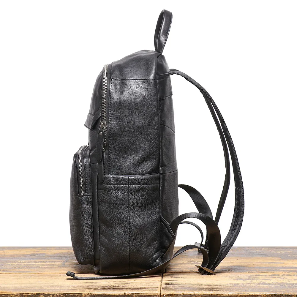 sac dos cuir vache beige texture rugueuse bandoulière arquée poches latérales supérieure arrière capacité grande polyester jacquard usage voyage business