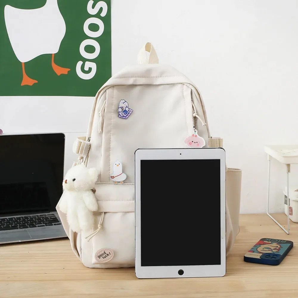 nouveau sac d'école de grande capacité portable couleur unie sac à dos léger sangle réglable sac de voyage en toile unisexe