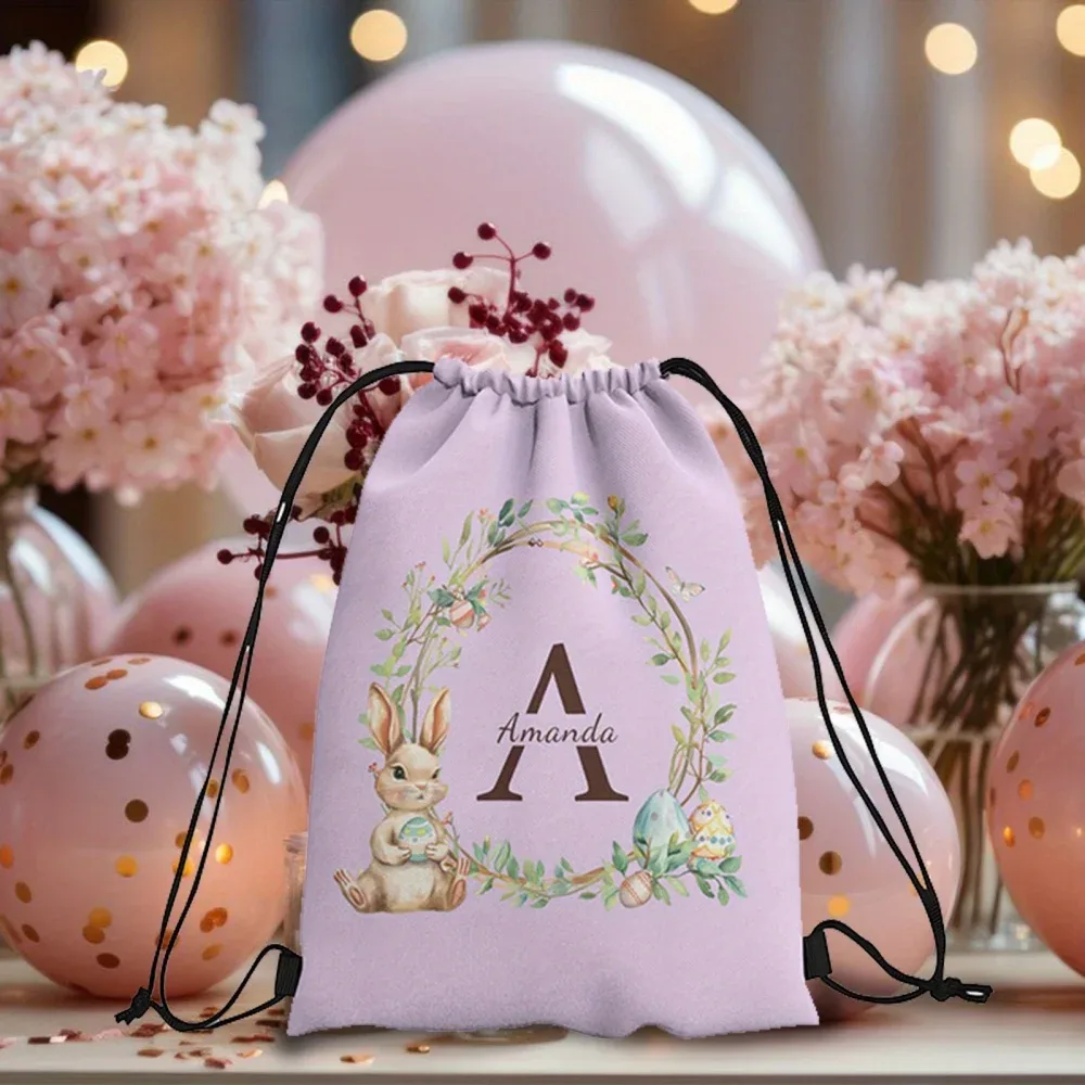 sac à dos à cordon personnalisable sur le thème de pâques, disponible en 4 couleurs fraîches au choix, personnalisé avec un nom unique – idéal pour les fêtes !