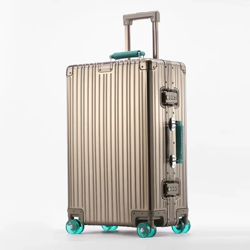 valise aluminium argenté roulettes oranges toupies ergonomiques poignées verticales voyage affaires élégante robuste durables
