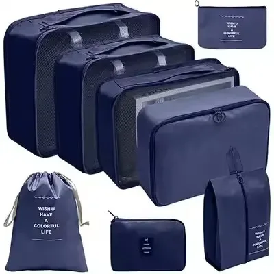 organisateur voyage polyester beige clair sac rangement vêtements chaussures sous-vêtements pochettes transparentes cubes modularité transport