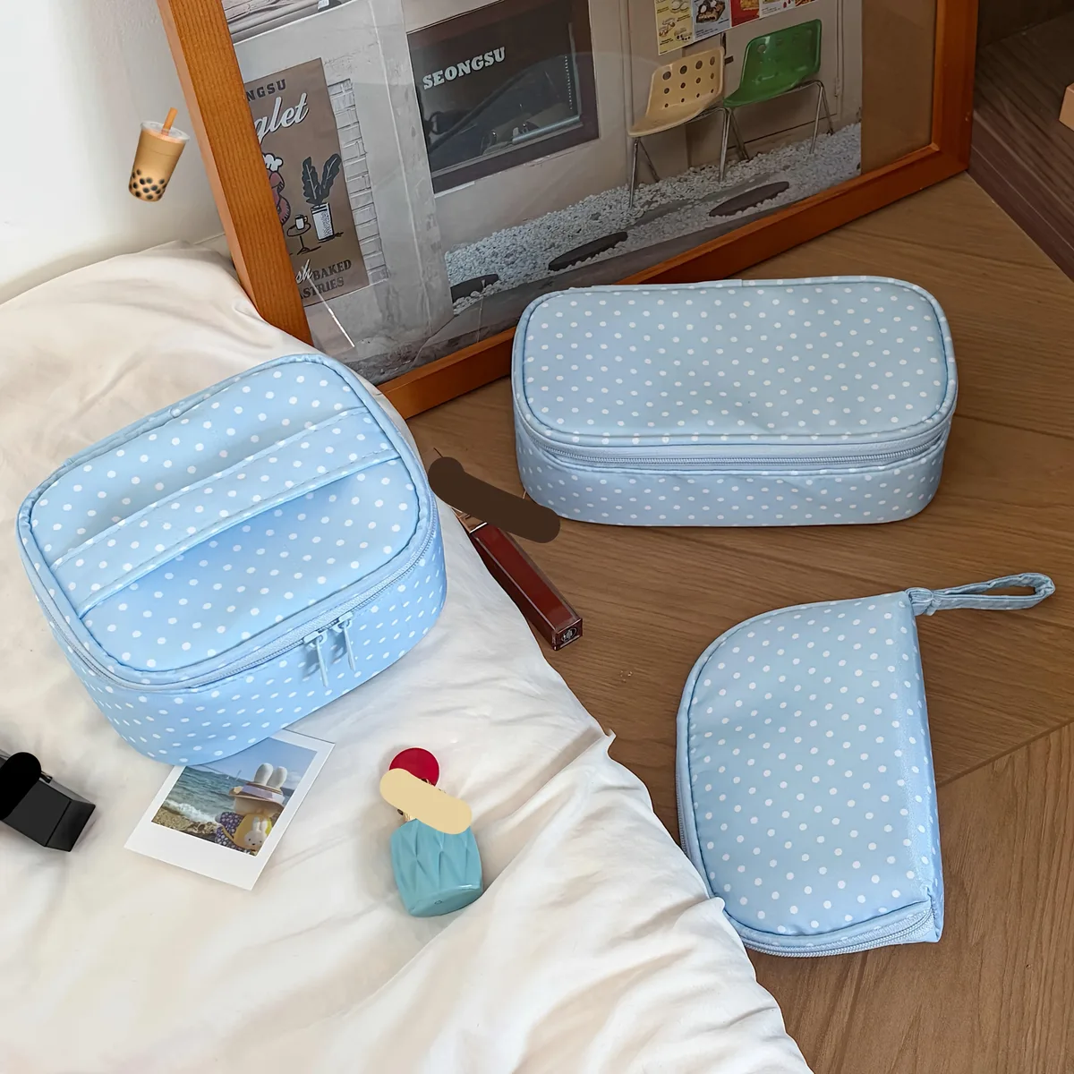 trousse polyester bleu clair pois blancs compacte ovale cosmétiques maquillage bijoux voyage usage journalier