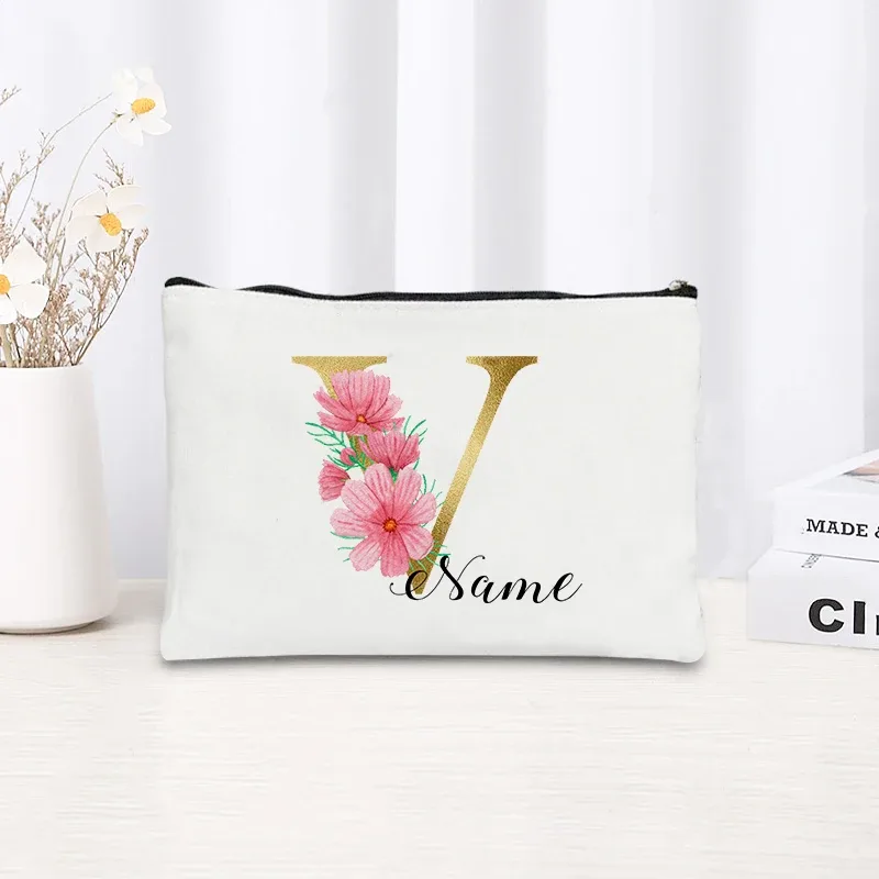 grande pochette zippée à motif floral rose et initiales dorées, organisateur d'essentiels de voyage en toile, trousse de maquillage pour enterrement de vie de jeune fille avec sac personnalisé avec nom.