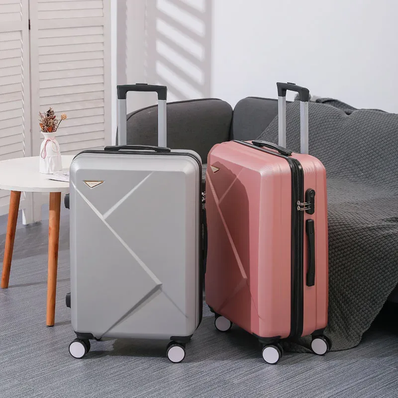 valise abs plastique dur motif géométrique lignes diagonales relief gris rose blanc jaune vert bleu rouge bagage affaires voyage