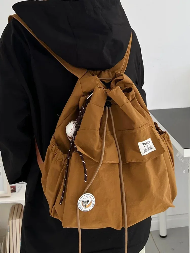 sac à dos léger et décontracté pour femme, idéal pour les voyages, les loisirs en plein air, en nylon, capacité 20-35l, avec compartiment pour ordinateur portable 14 pouces