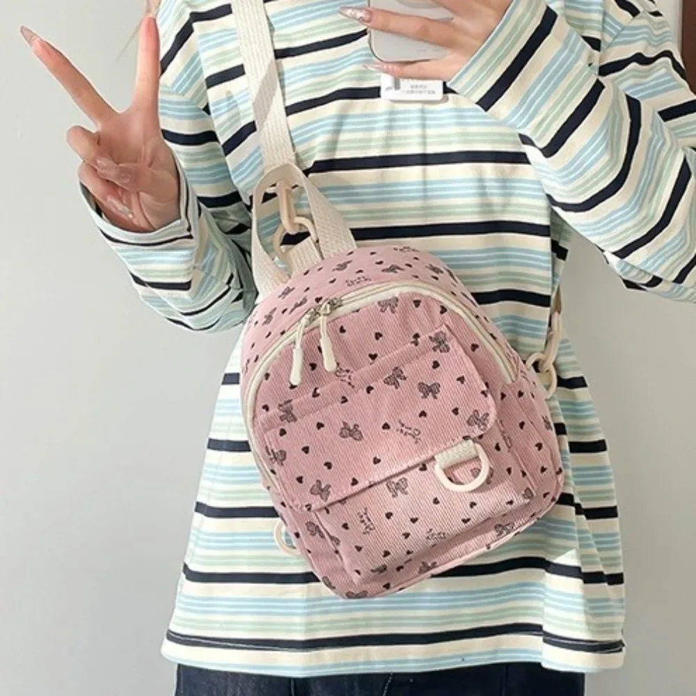 sac à dos mini en velours côtelé mignon et léger avec imprimé cœur et nœud, sac à bandoulière à fermeture éclair, sac à dos multi-compartiments pour usage quotidien