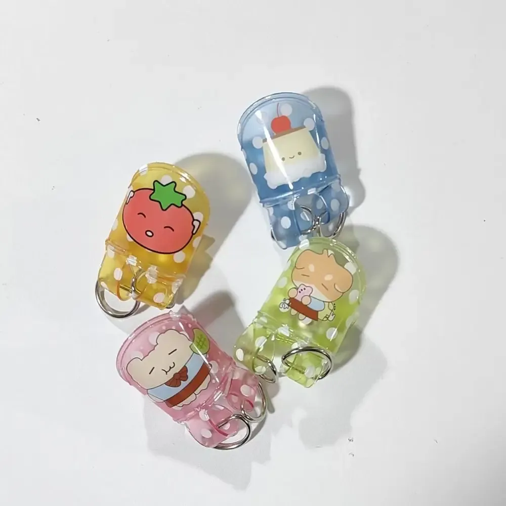 porte clé animaux fruits transparent bleu vert jaune rose design kawaii mignon pois bouton central double anneaux métalliques support breloque voyage accessoire