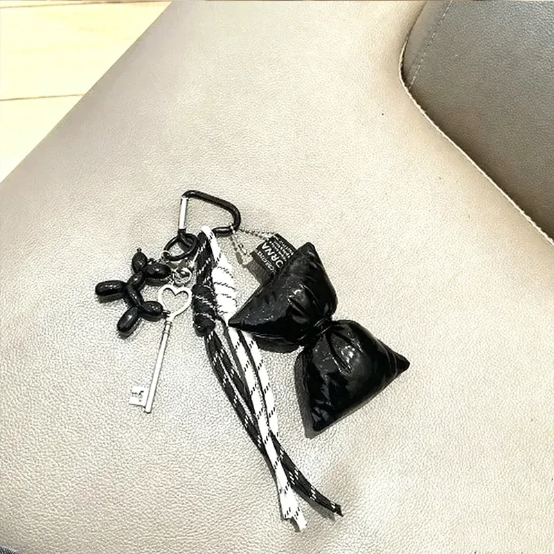 porte-clés à nœud en cuir matelassé doux, organisateur, mini breloque de sac mignon pour filles, porte-clés à nœud coréen avec pendentif