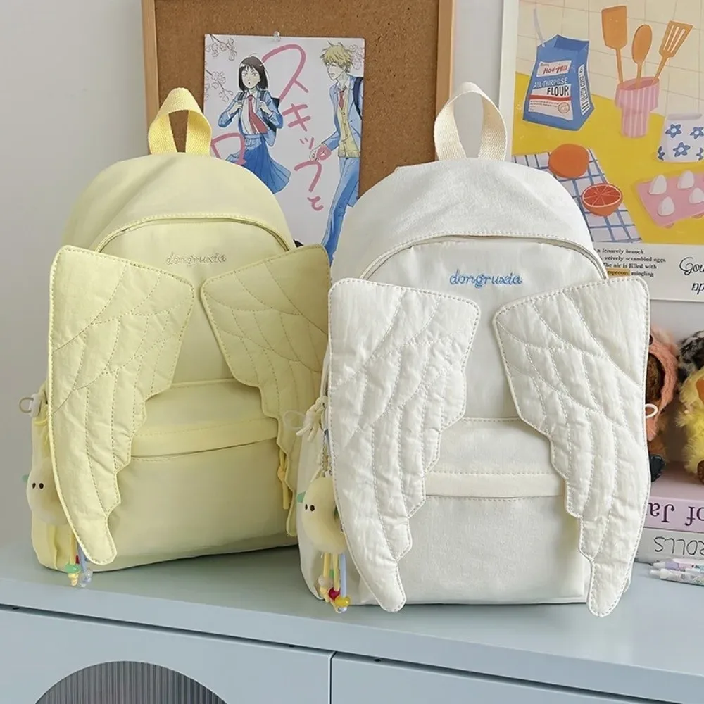 sac à dos polyvalent à ailes d'ange, couleur unie, grande capacité, en nylon, style y2k, sac à dos léger en toile pour adultes et étudiants