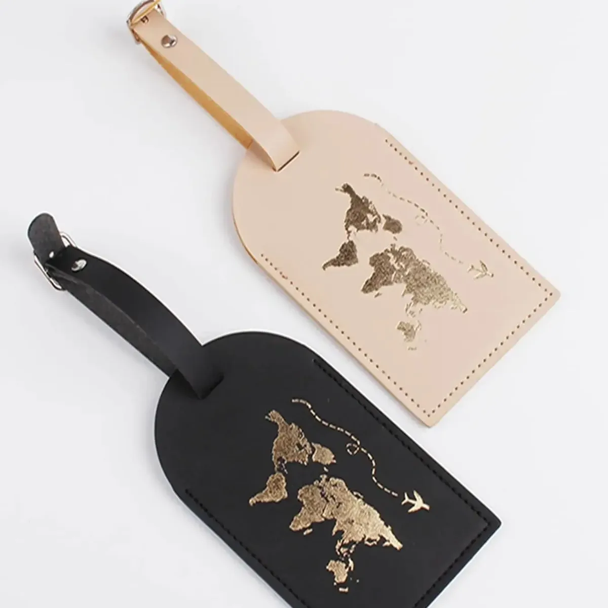 étiquette bagage pu leather ovale noir motif doré carte monde rose clair voyage identification bagage