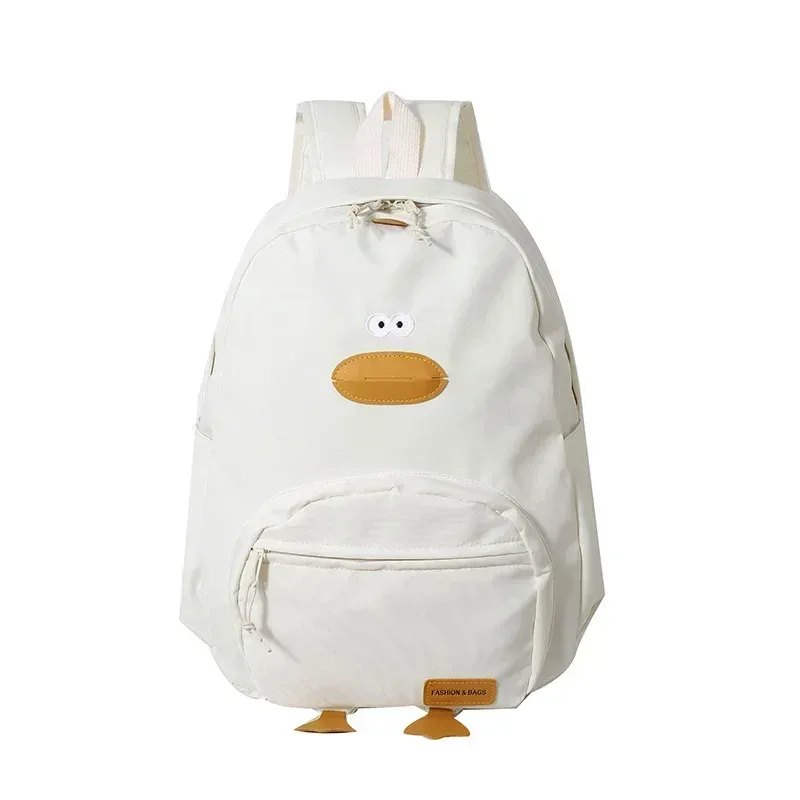 sac dos nylon noir jaune beige forme rectangulaire poignée souple bandoulière arquée fermeture glissière voyage femme étudiant école polyvalent