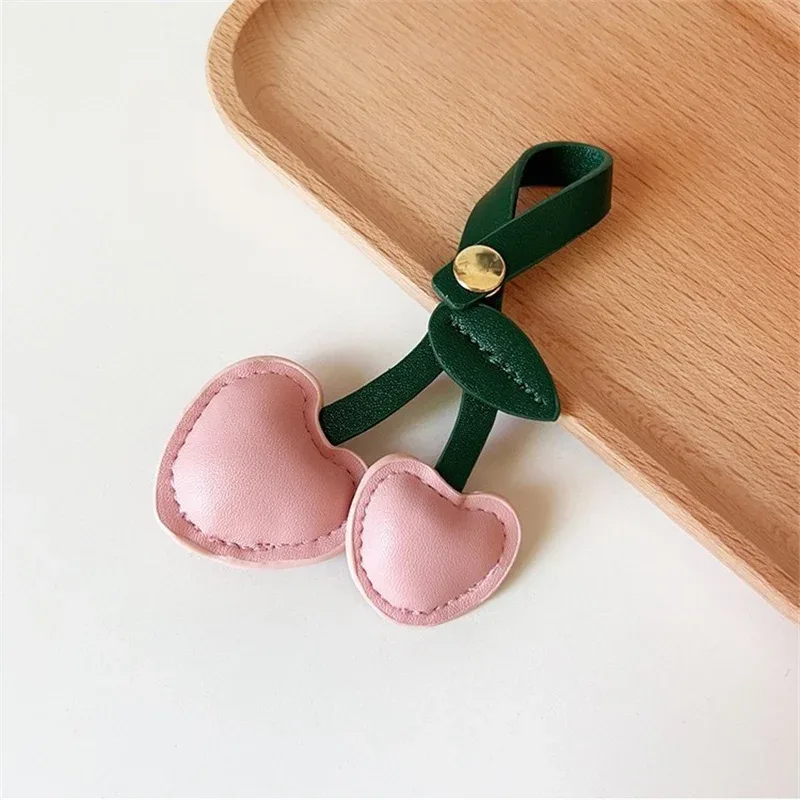 xmessun nouveau porte-clés pendentif cœur cerise rose pour sac à dos femme, breloque en cuir véritable tendance