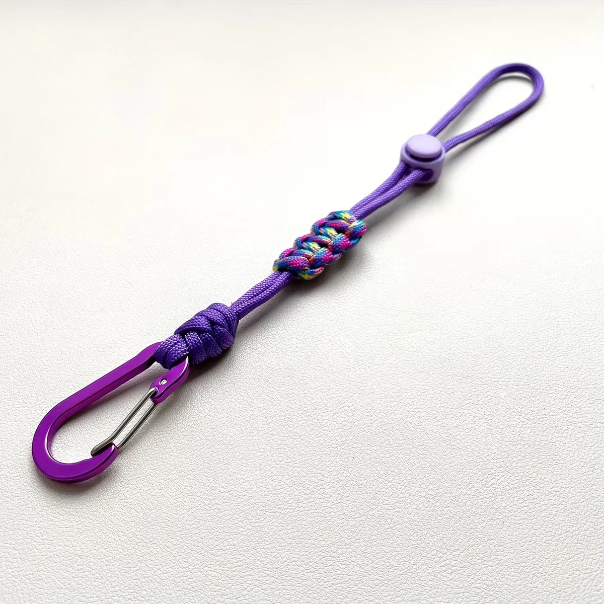 porte bouteille cordon paracord boucle métal nœud décoratif voyage randonnée jaune noir orange violet marron