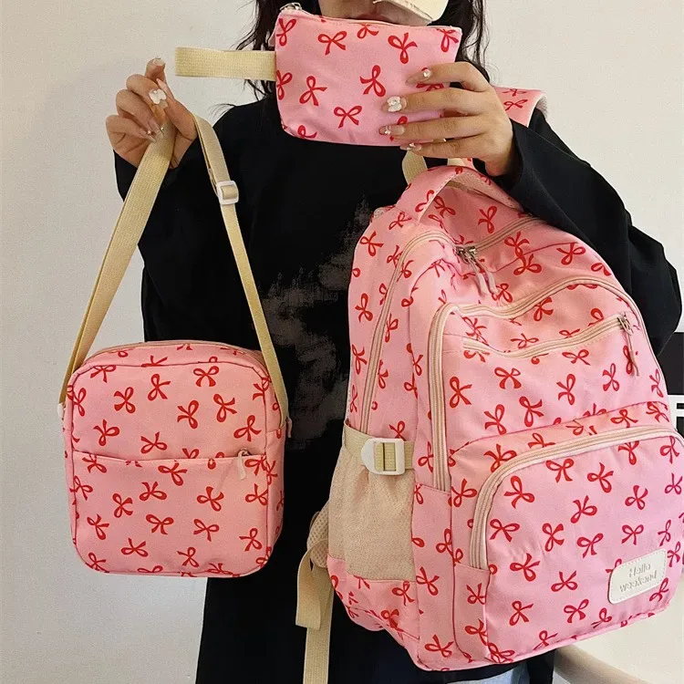 Sac Dos Polyester Motifs Nœuds Rose Clair Blanc Noir Bandoulière Poignées Latérales Voyage Scolaire Femmes