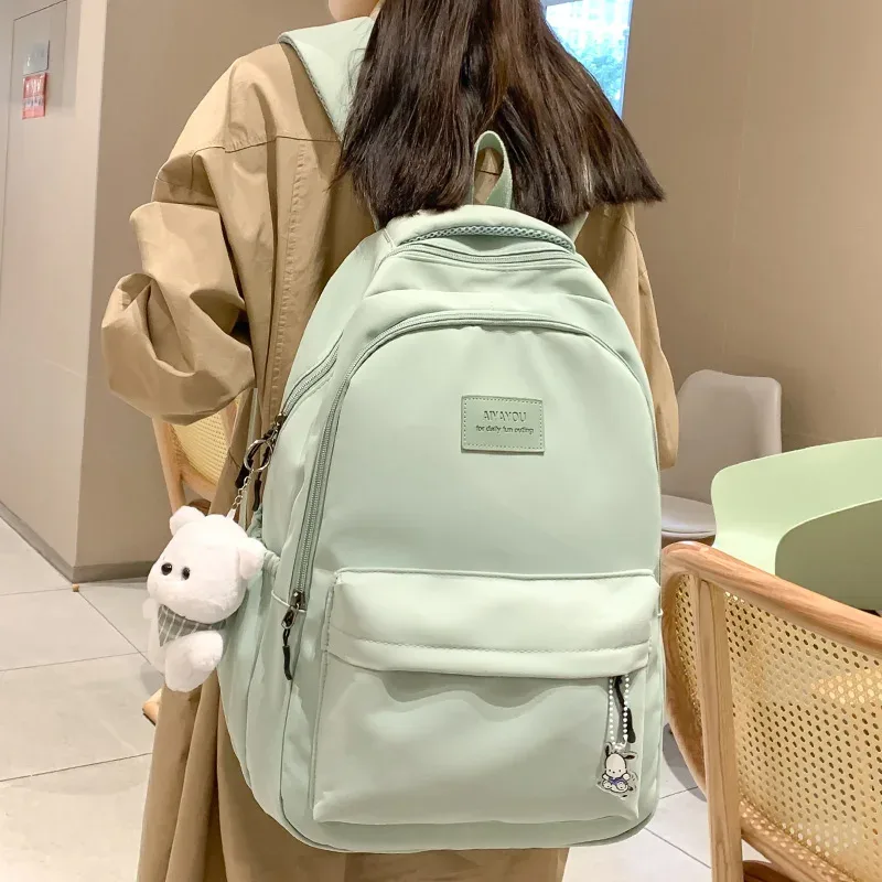sac à dos d'étudiant rose imperméable à la mode pour femmes, nouveau sac d'école de loisirs de voyage pour filles, sac d'université de livre mignon en nylon pour ordinateur portable