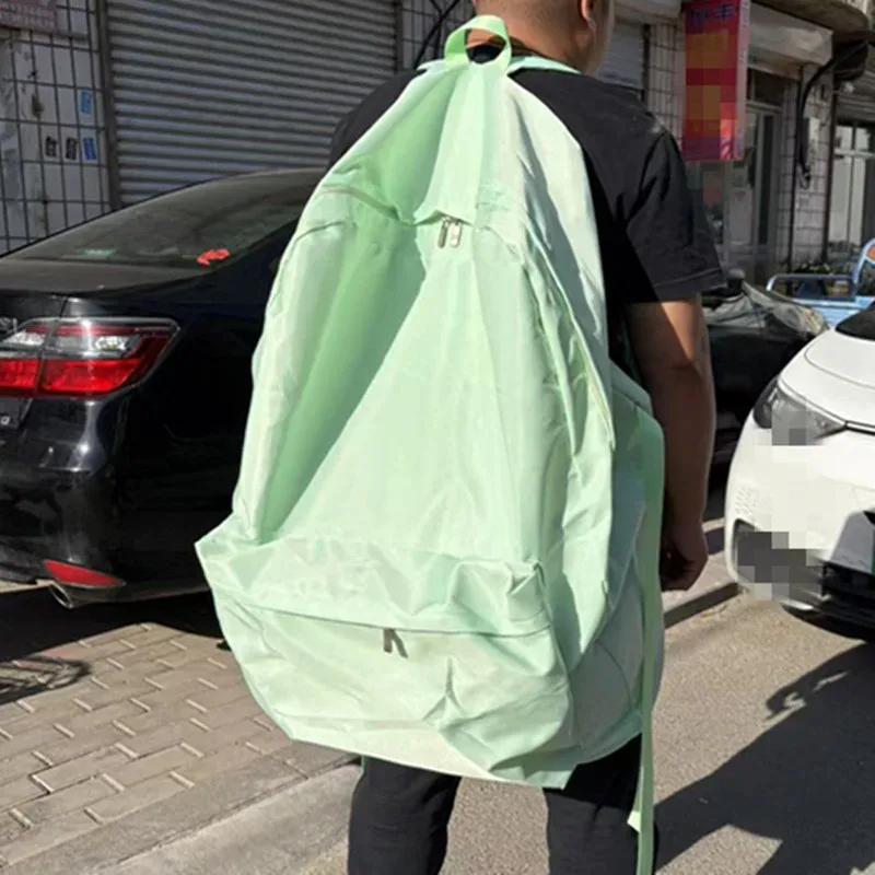 sac dos polyester violet vert bleu rouge jaune rose forme trapézoïdale poches latérales fermeture glissière usage voyage grande capacité