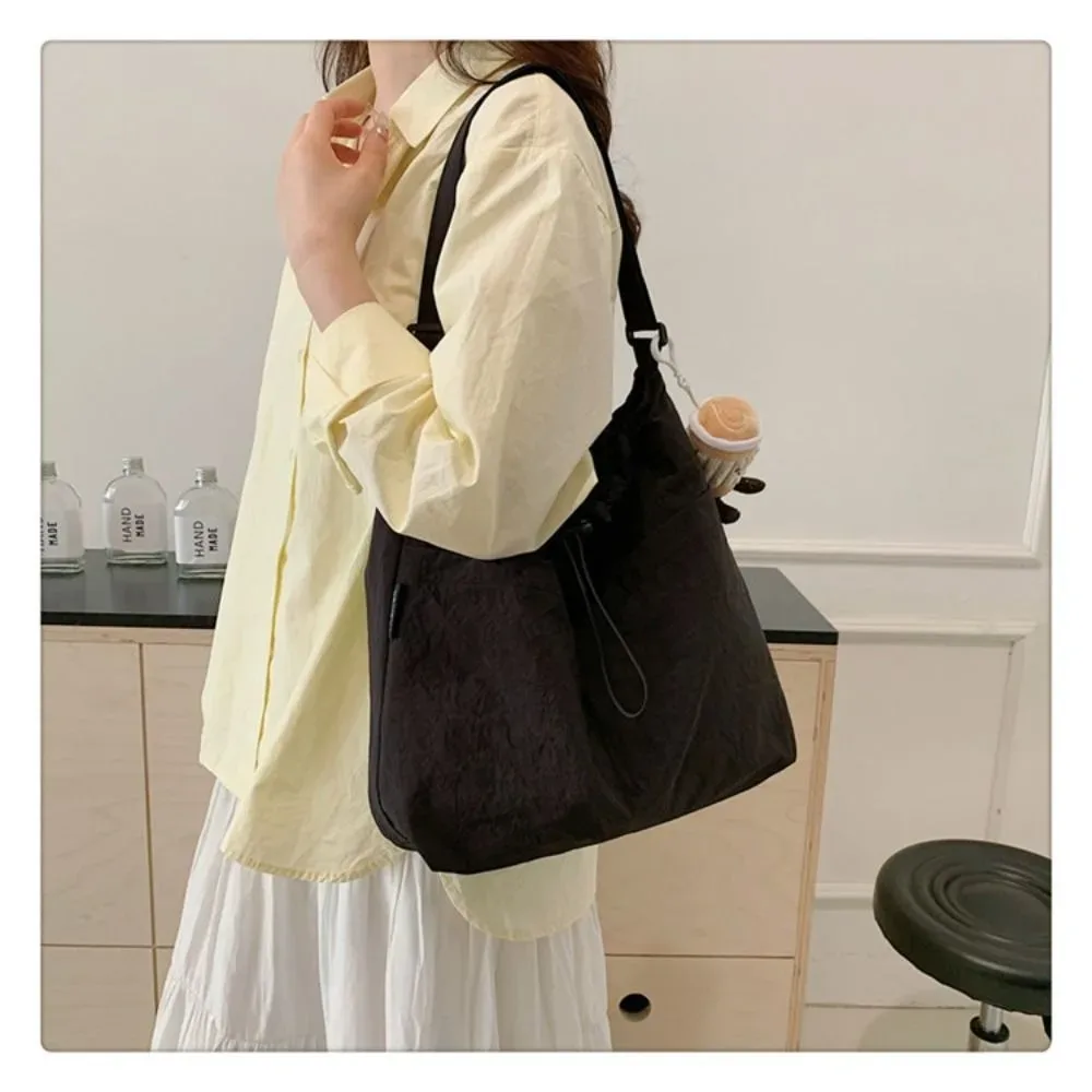 sac fourre-tout en nylon pour femmes, fourre-tout décontracté de voyage à la mode, sac à bandoulière avec cordon de serrage, grande capacité, sac seau étanche