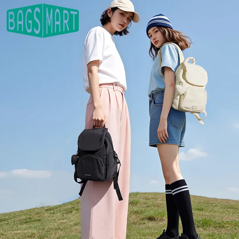 sac dos nylon rose clair poche avant rabat souple imperméable compartiment informatique usage universitaire école bureau voyage