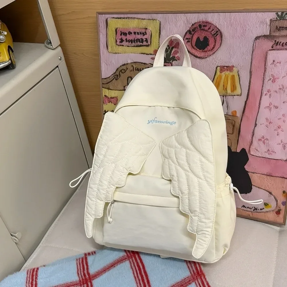 sac à dos polyvalent à ailes d'ange, couleur unie, grande capacité, en nylon, style y2k, sac à dos léger en toile pour adultes et étudiants