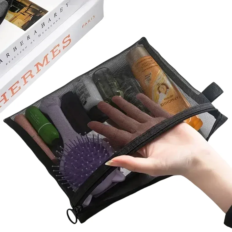 trousse toilette nylon transparente gris poignées noires poches zippées accessoires maquillage voyage usage universel