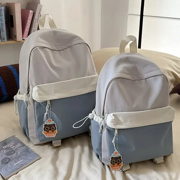 nouveau sac à dos de style japonais esthétique, léger, grande capacité, bicolore, pour jeunes.