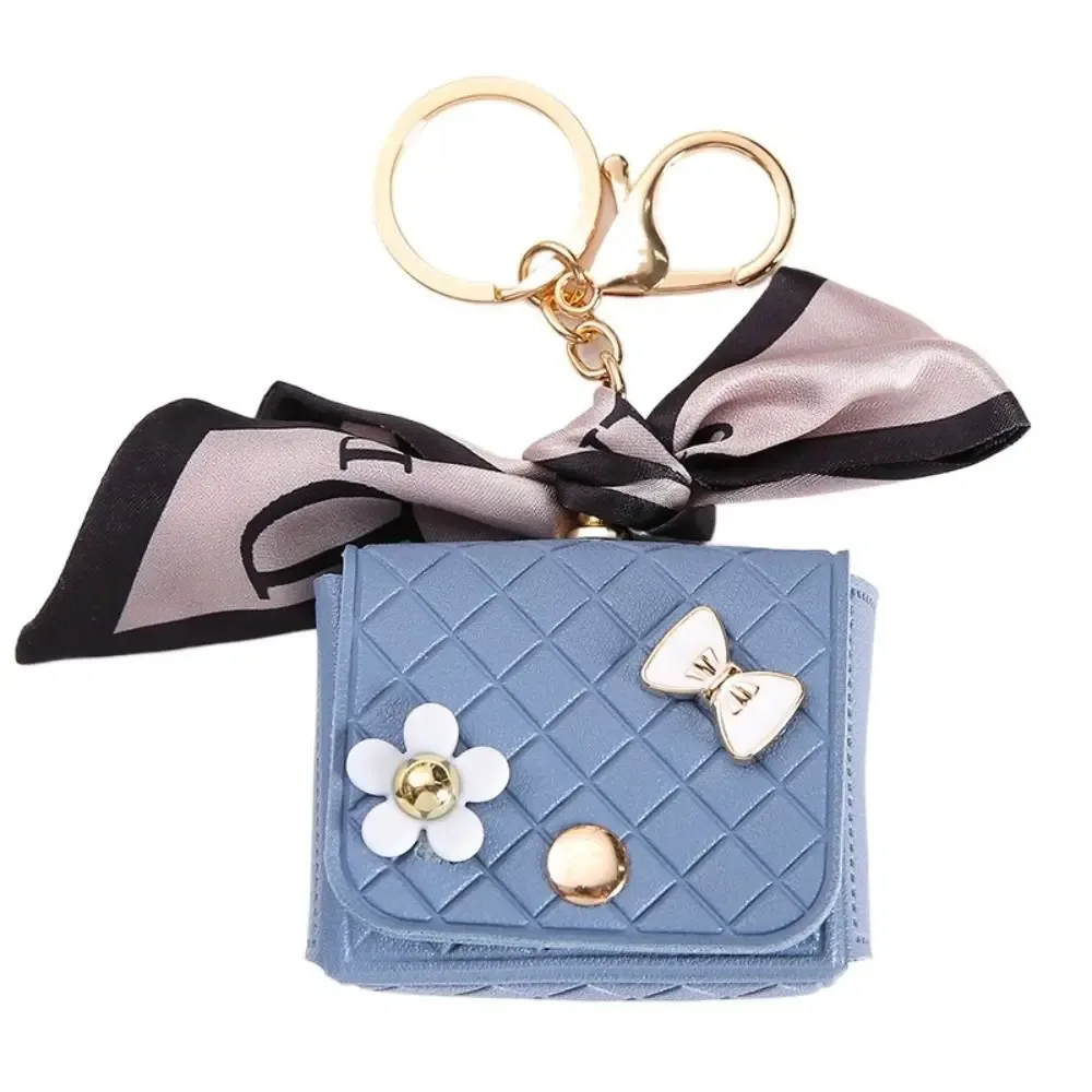 nouvelle pochette de rangement en cuir 2026 pour écouteurs, mini porte-clés créatif, pendentif couleur unie, étui pour écouteurs bluetooth